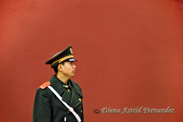 China-Soldier-against-red-wall-Forbidden-City-China